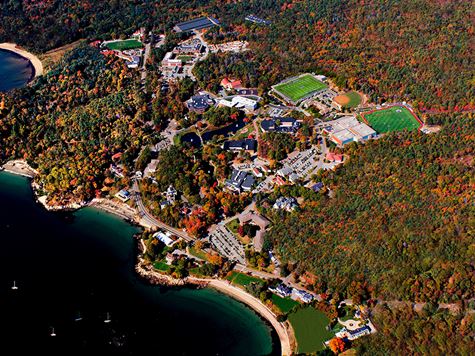 aerial shot of endicott campus during the day with ocean on the left