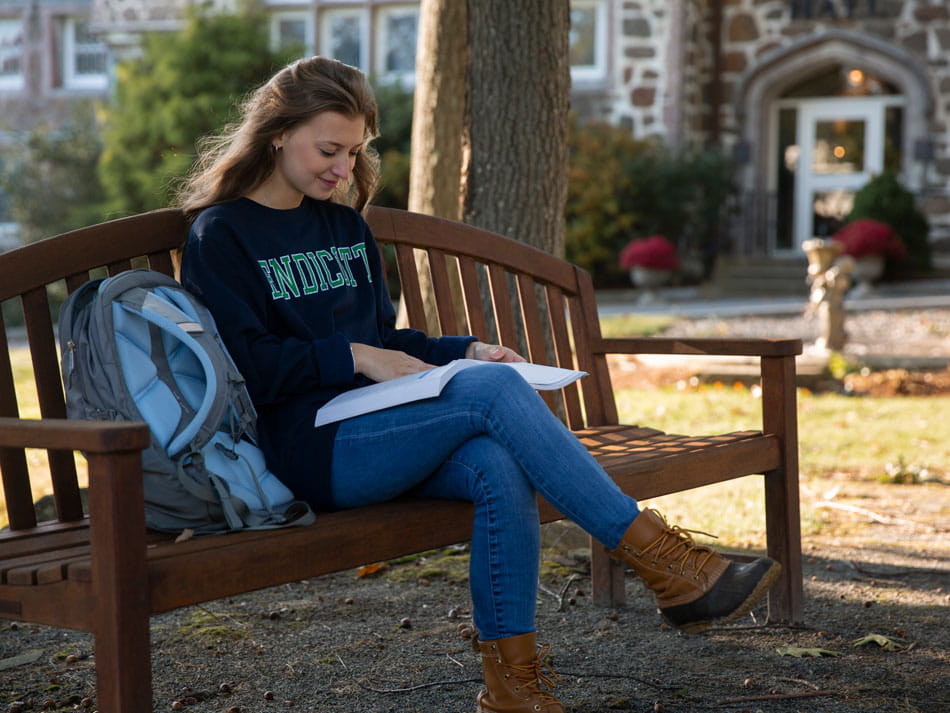 A student studies outside