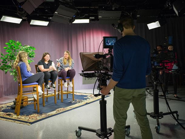 Endicott College students in a TV filming room