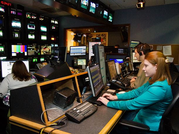 Endicott College students in a TV production room