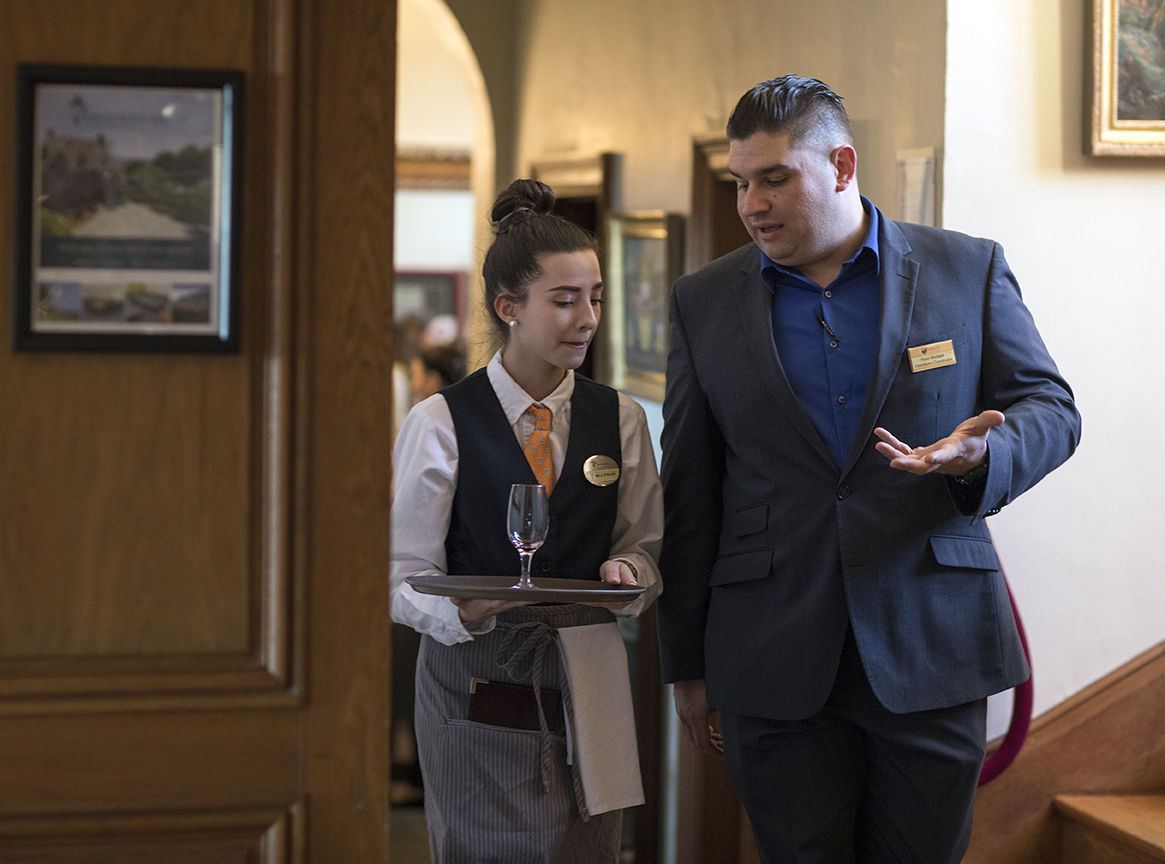 Hospitality Management students supervise dining experience at LaChanterelle dinner for alumni