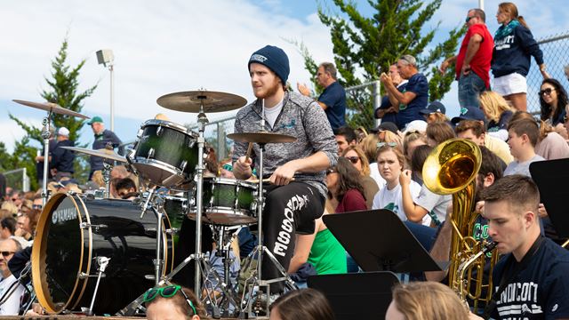 A band plays in the Melissa Hempstead Stadium at Homecoming & Family Weekend