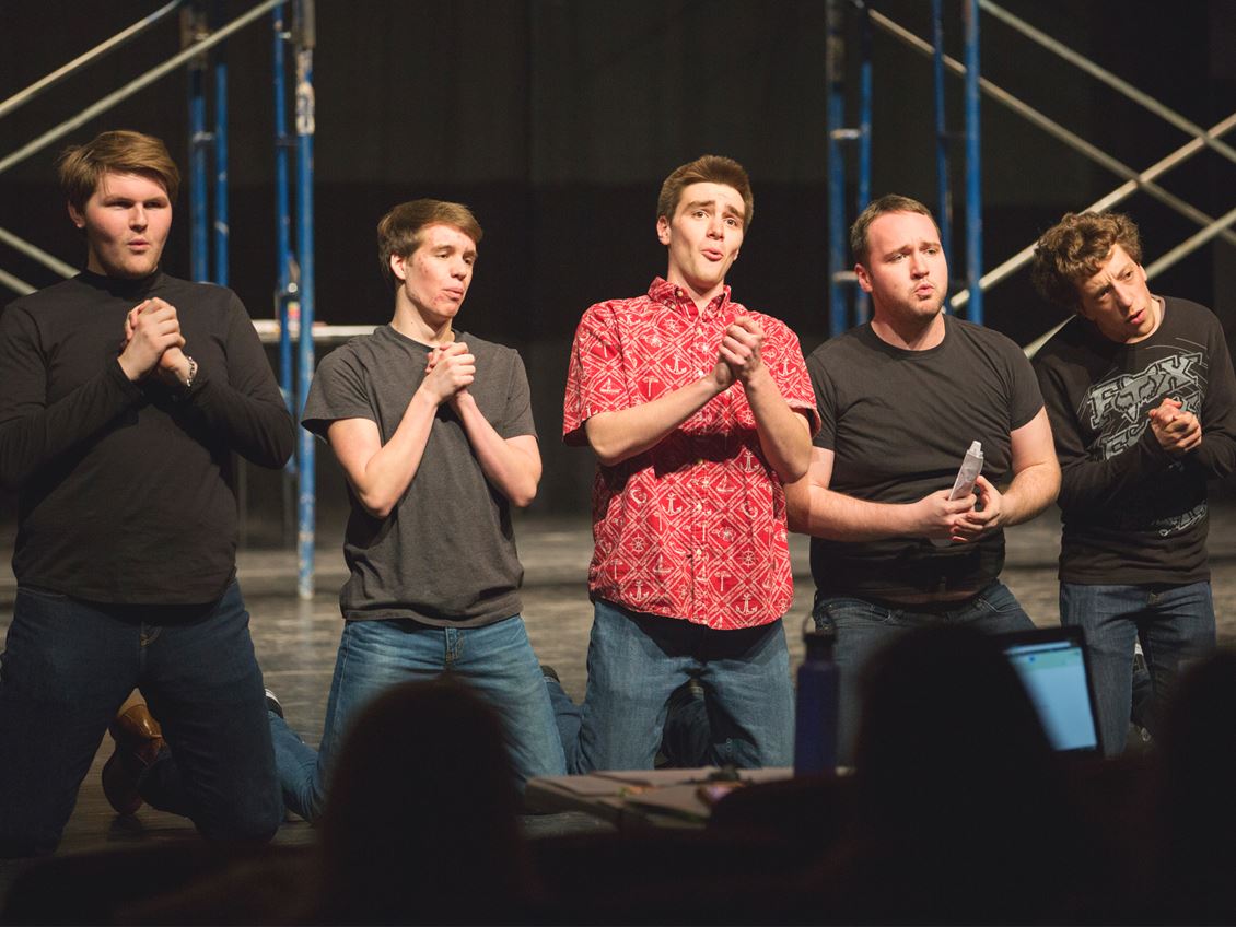 students perform West Side Story on stage