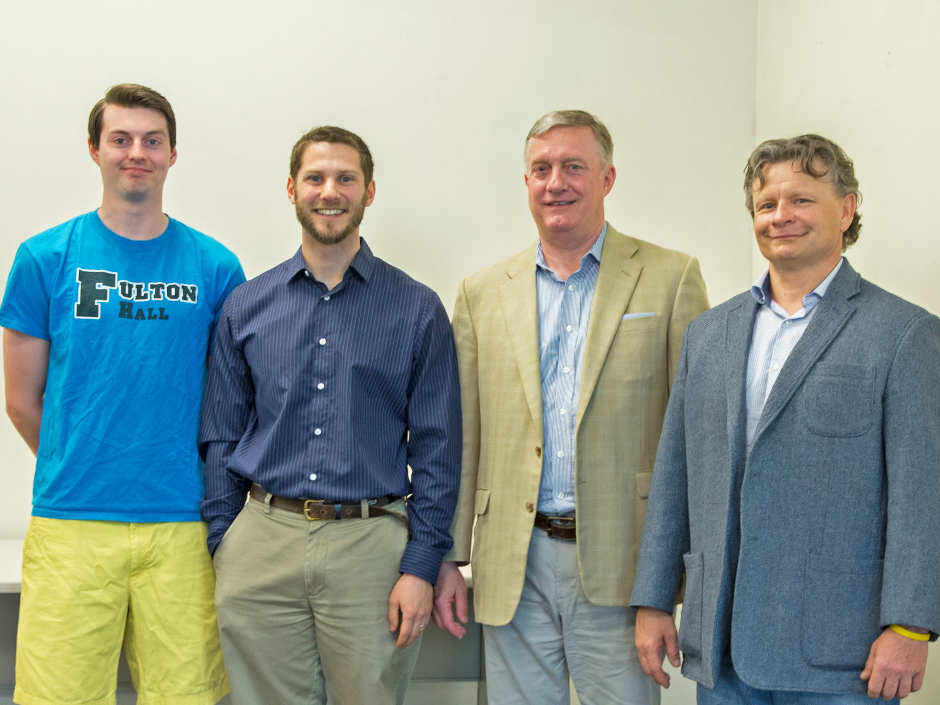 The winner of the North Shore Data Modeling Competition poses with Net Atlantic representatives 