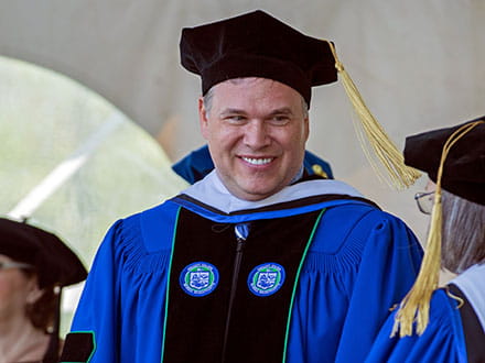 Garold Miller, CEO of HALO, speaking on stage at the 2019 Undergraduate College Commencement
