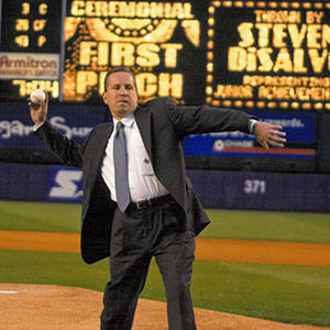 Dr. DiSalvo throwing out the first pitch at a New York Mets game on May 21, 2003