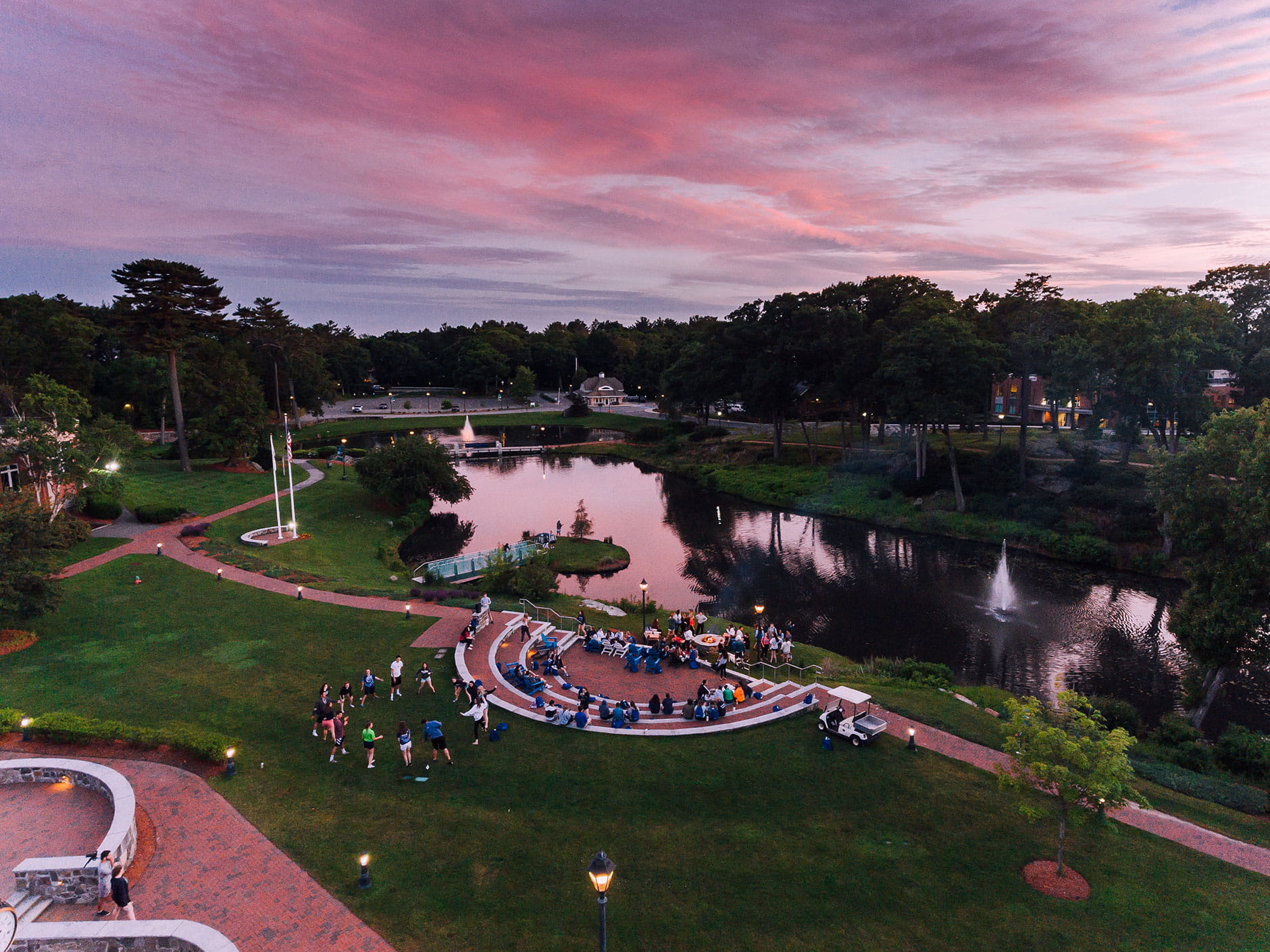 Aerial view of amphitheater at dusk as students convene
