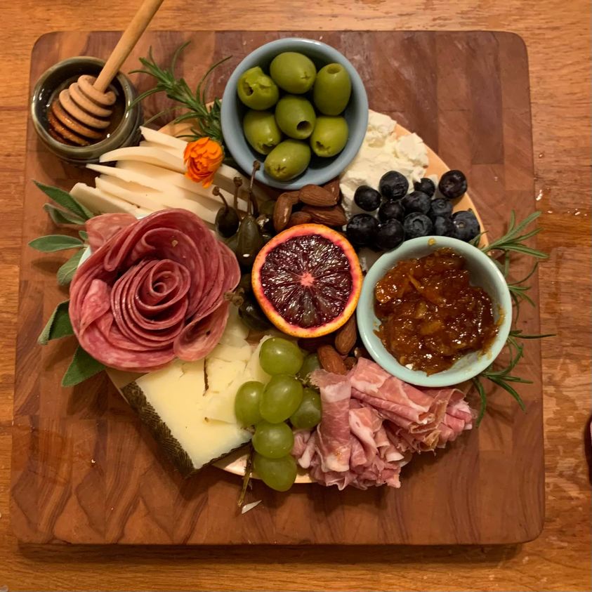 board with cheese and meats