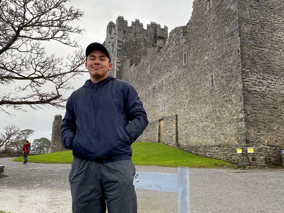 Study Abroad student image male in front of wall