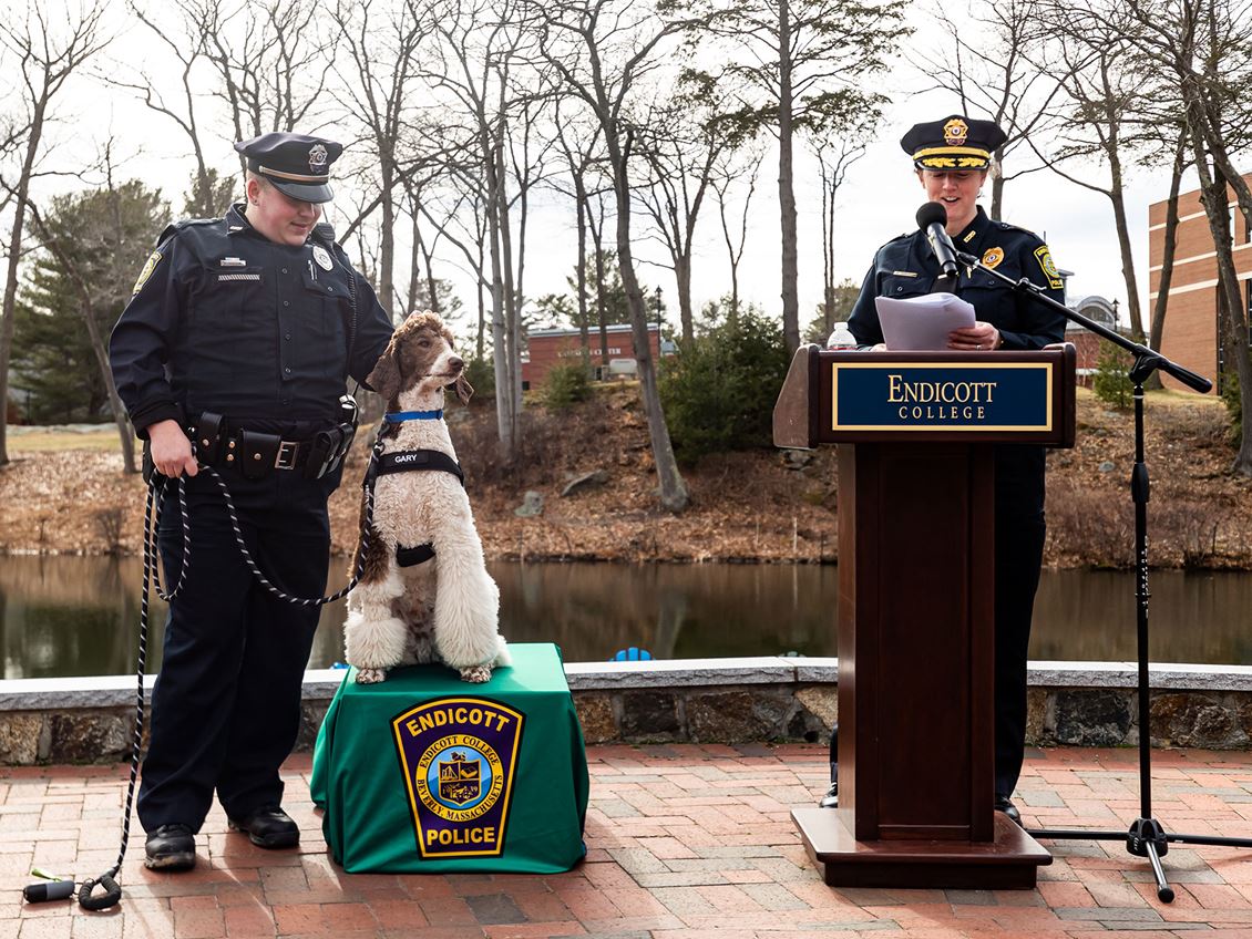 Officer Elliot Lanciani and Chief of Police Kerry Ramsdell with Gary
