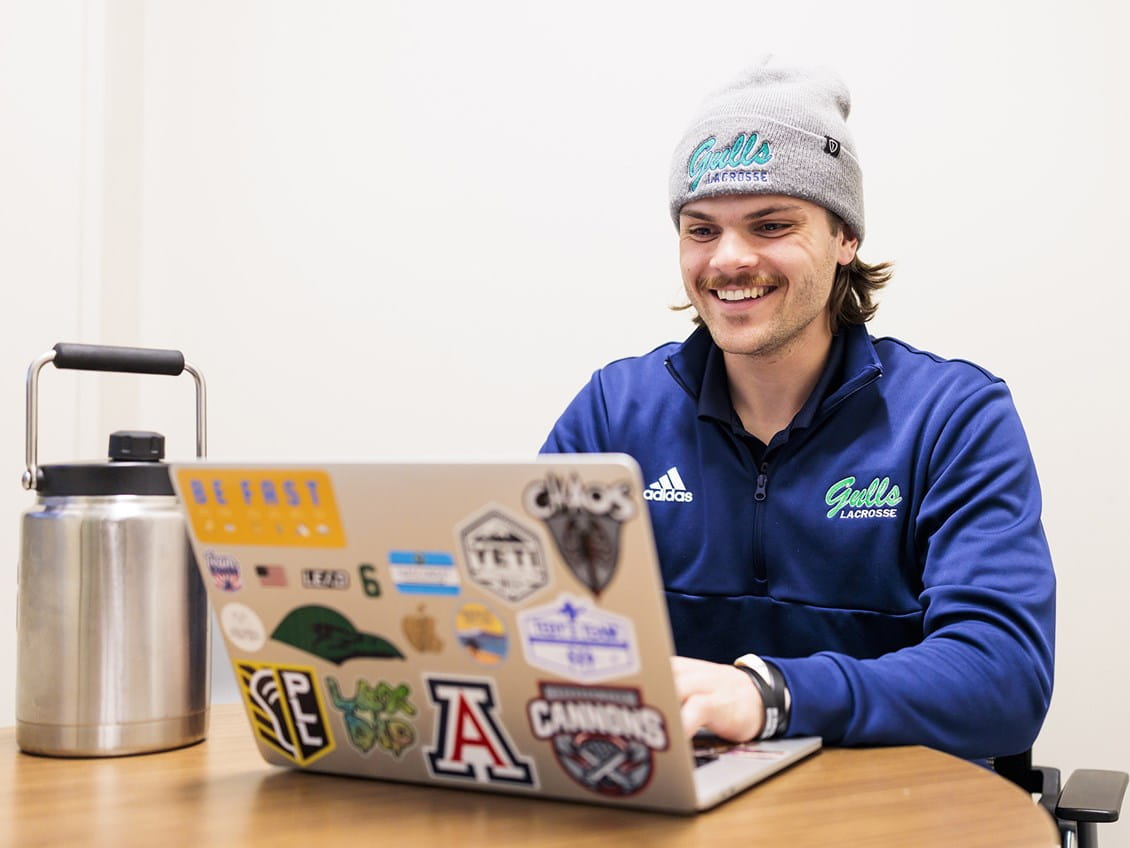Endicott student with laptop