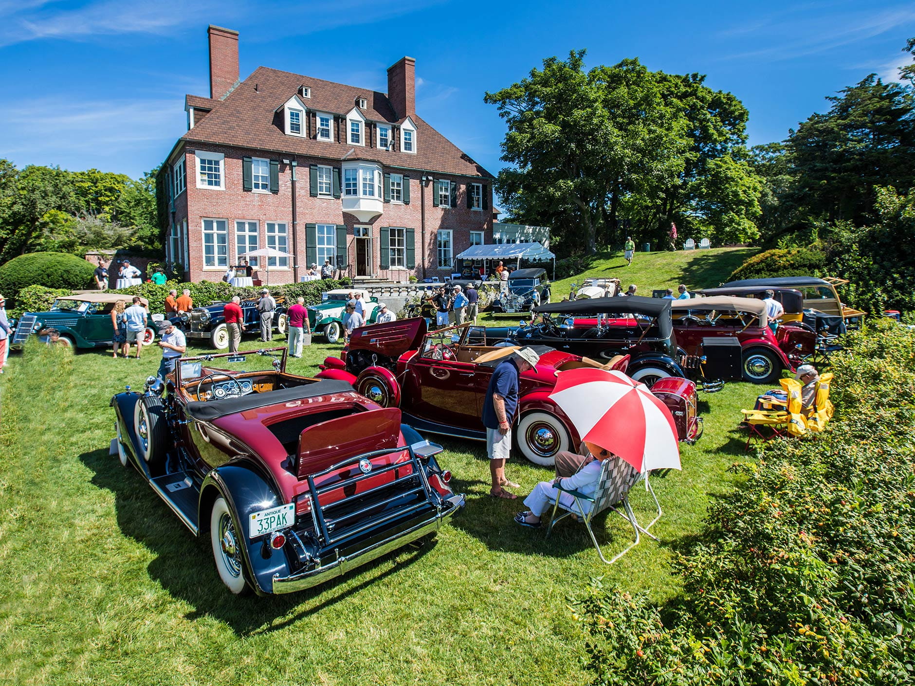 Antique cars on the back lawn of Misselwood during the Concours d'Elegance.