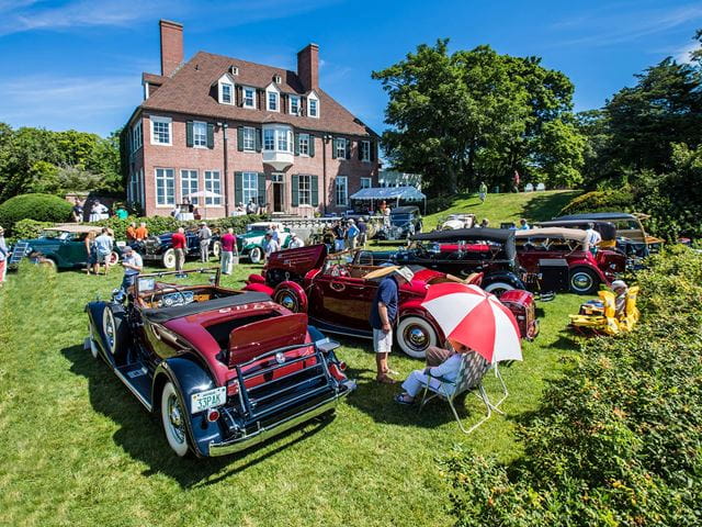 Antique cars on the back lawn of Misselwood during the Concours d'Elegance.