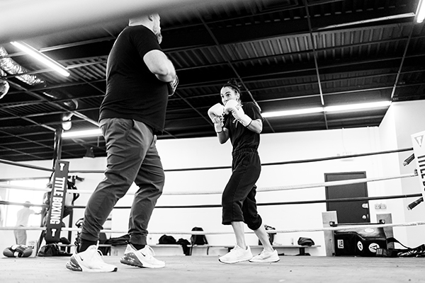 Jenn Perella ’05 boxing in the ring