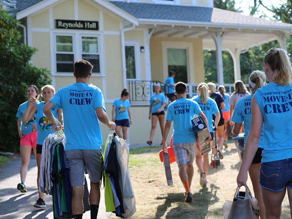 students moving into residence hall during first week of school