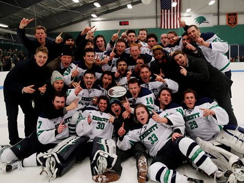 picture of mens hockey team on ice after victory