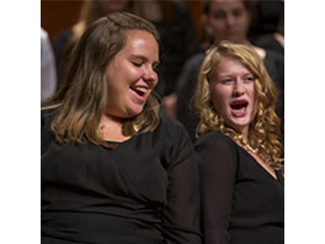 two women singing