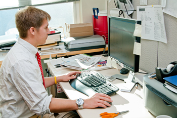 Endicott student working at computer during Internship