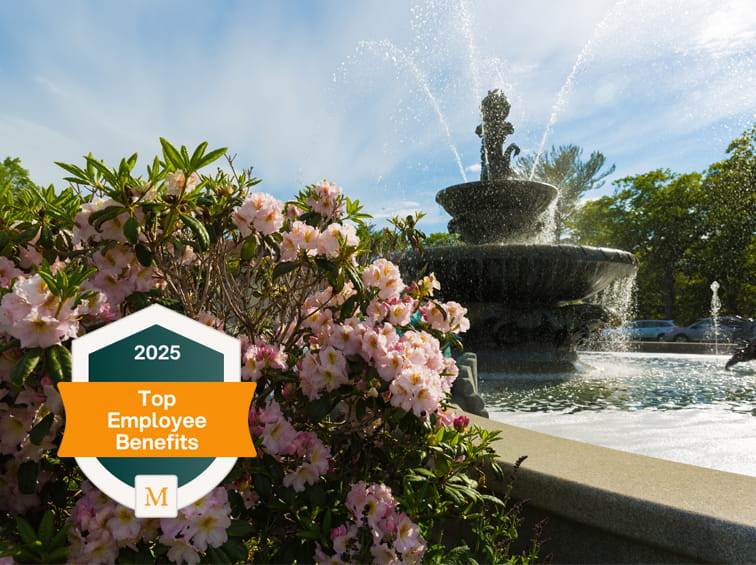2025 top employee benefits award logo over Endicott campus scenic