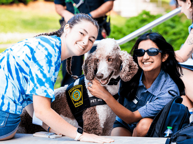 Students with Gary the comfort dog