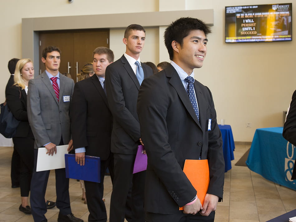 business professionals standing in line