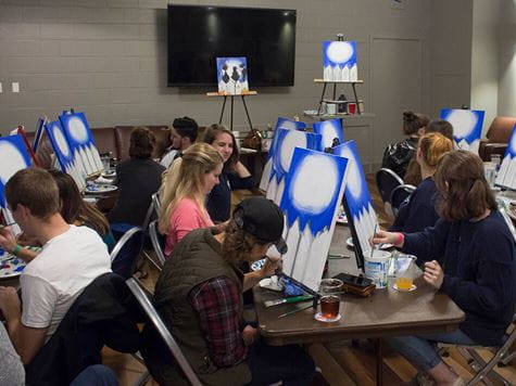group of students having a paint night